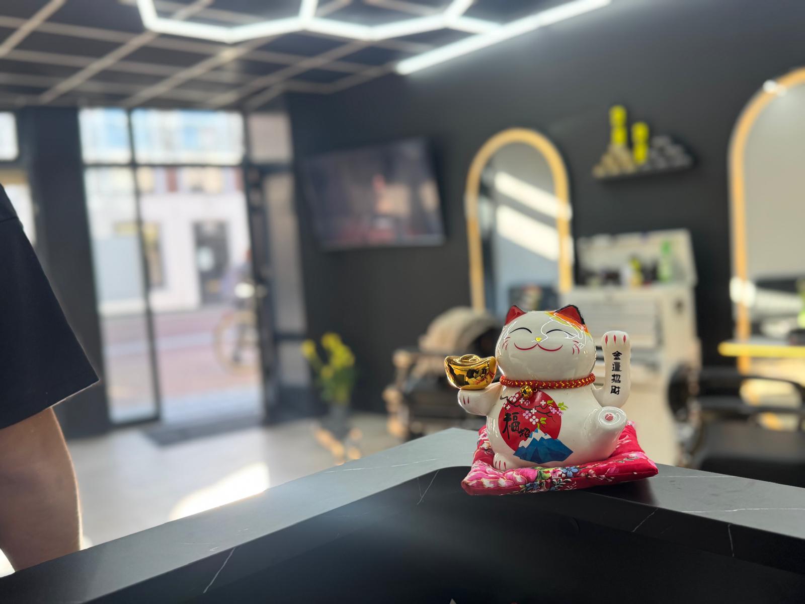 Detail van de ontvangstbalie in Barbershop De Rijn